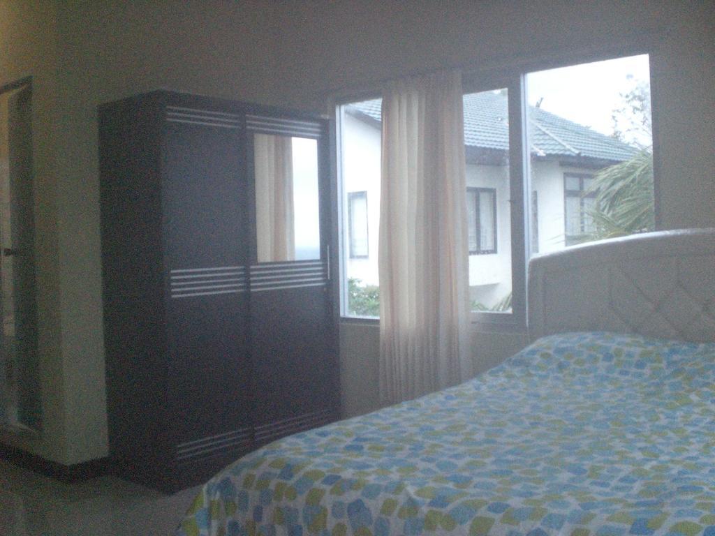 Sentosa76 Guest House Balikpapan  Bilik gambar